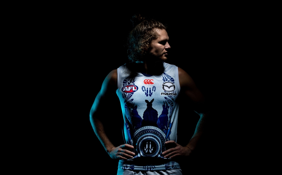 Jed Anderson models North Melbourne's Indigenous jumper at Arden Street Oval on May 17, 2021. Picture: Getty Images